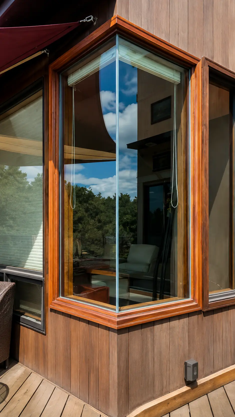 Custom corner window set in warm wood framing